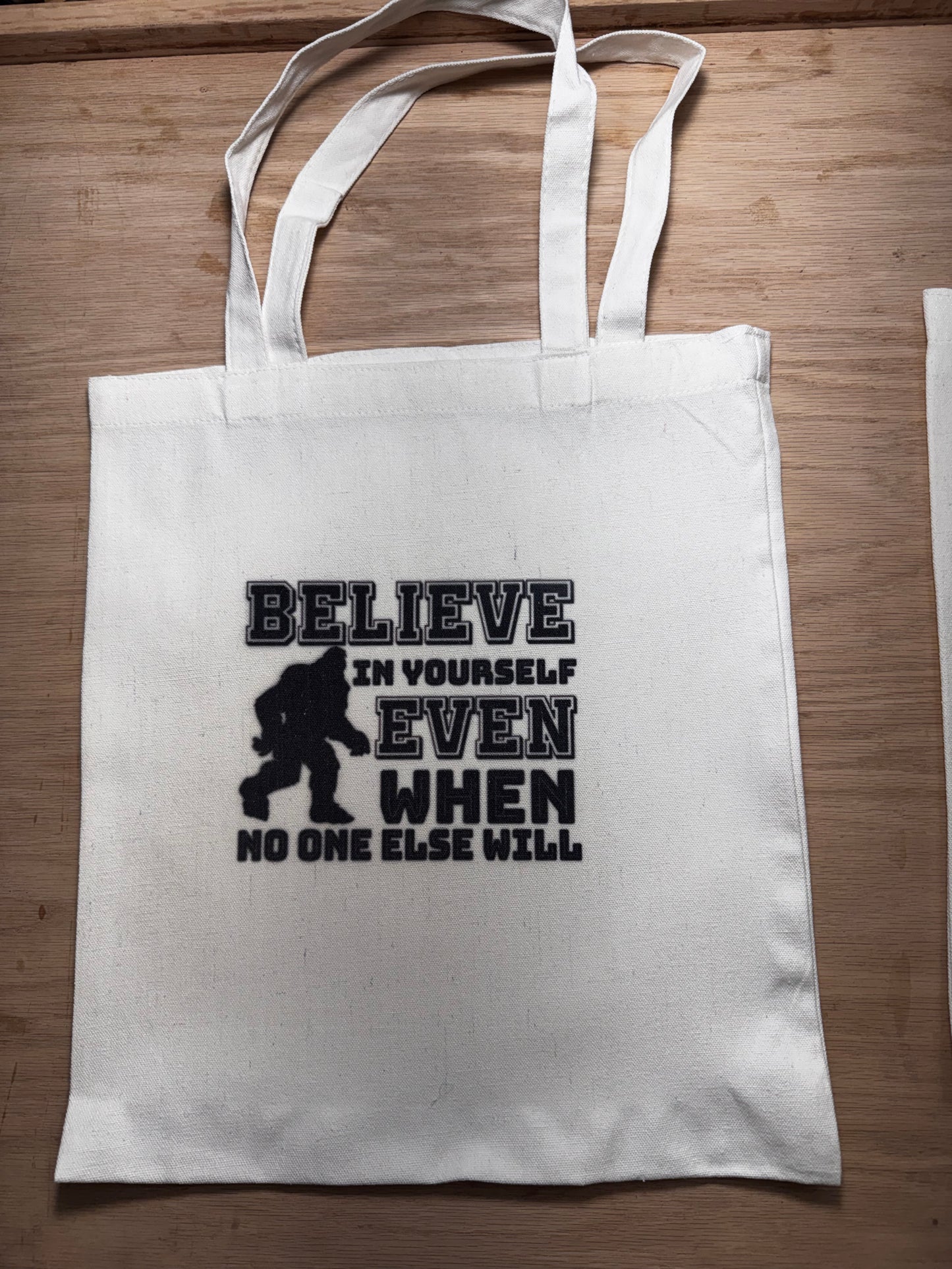 Fashionable monochrome tote bag - “Believe in Yourself Even When No One Else Will”
