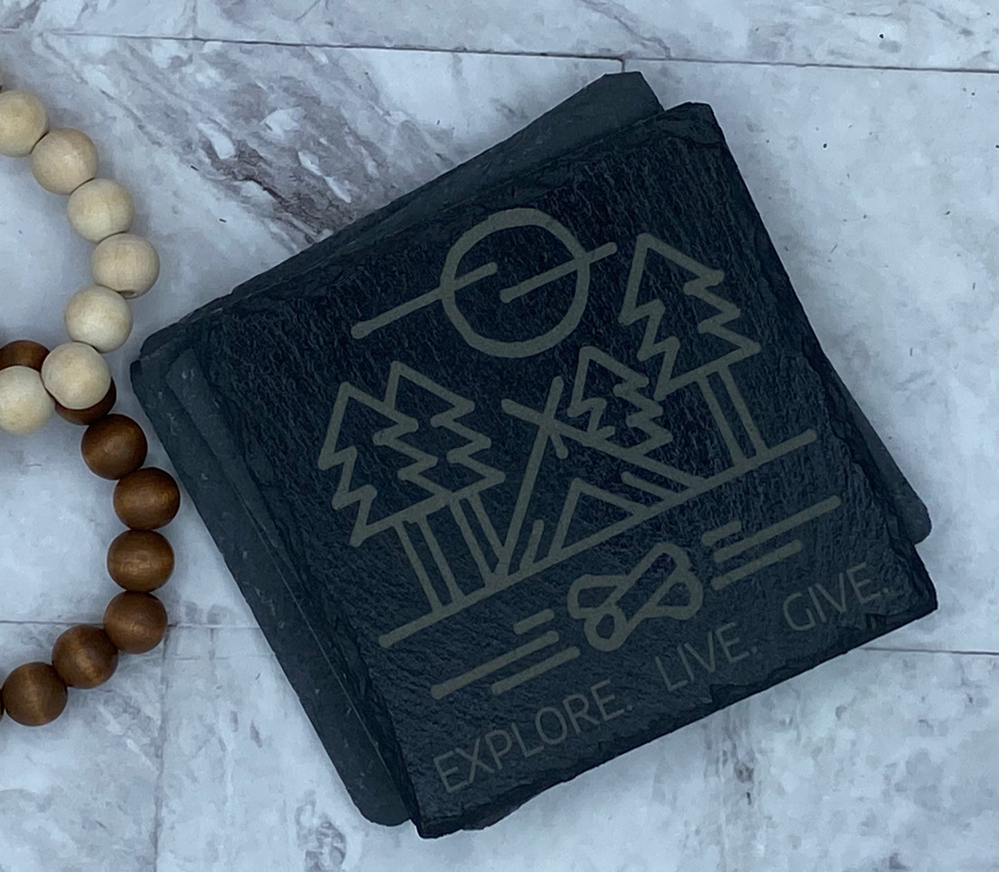 "Explore. Live. Give" Engraved coasters on slate