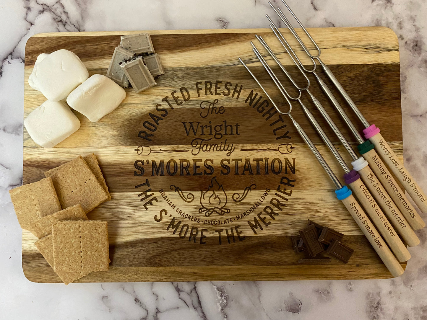 Personalized S'mores station with personalized telescoping marshmallow roasting forks